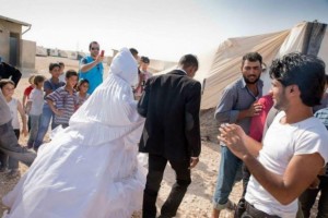زواج سوري في مخيمات اللجوء (AFP)