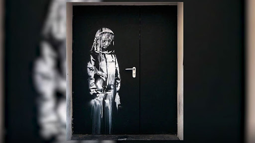 Banksy mural on the entrance of Bataclan Theatre