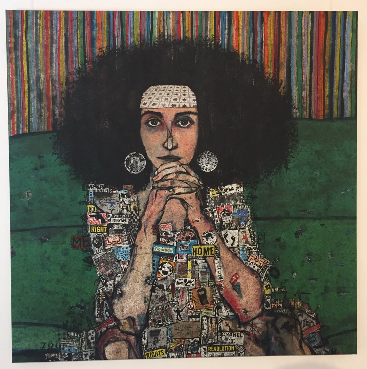 لوحة الفنانة زينة عاصي من لبنان بعنوان «القوة في يد المرأة»